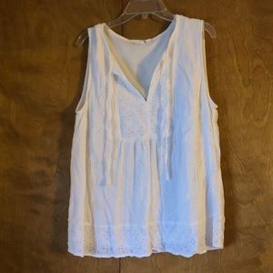White sleeveless blouse